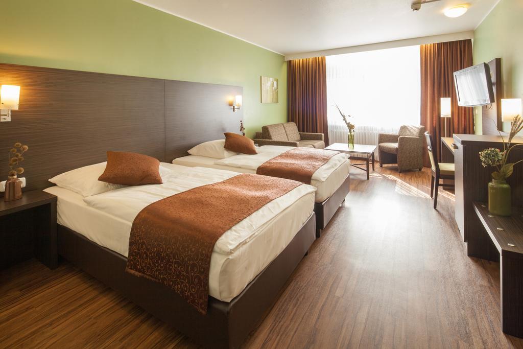Hotel Mondial Langenfeld  Pokoj fotografie
